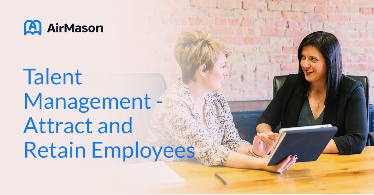 Two employees speaking together with the title text "Talent Management - Attract and Retain Employees"