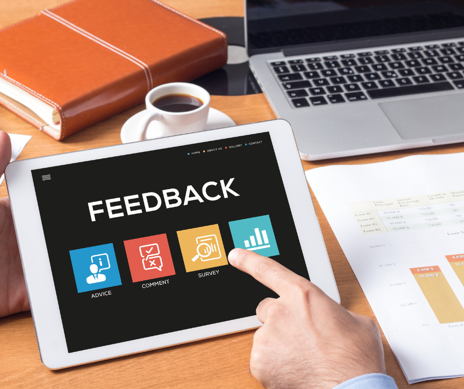 An image showing a user holding a manual and providing feedback, as an example of manual feedback.