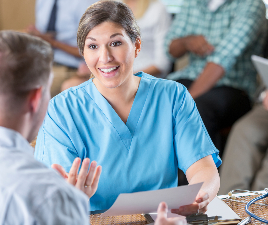 Healthcare employee assessing a client