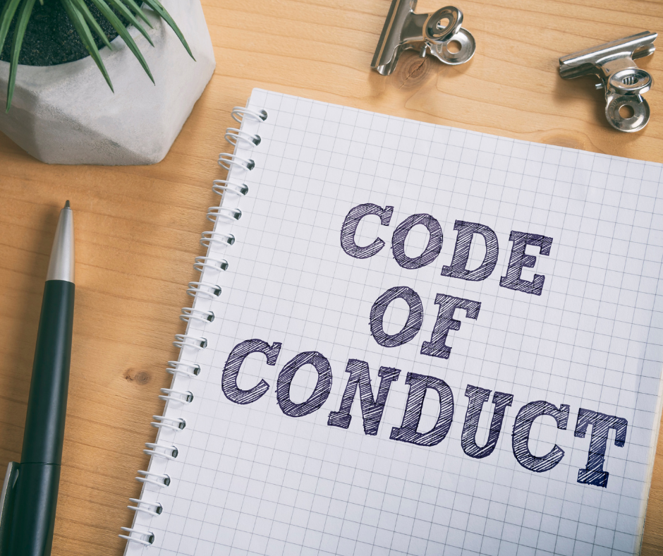 Group of Cheniere Energy employees discussing code of conduct